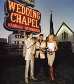 Elvis impersonator Jesse Garon officiating a Las Vegas wedding
